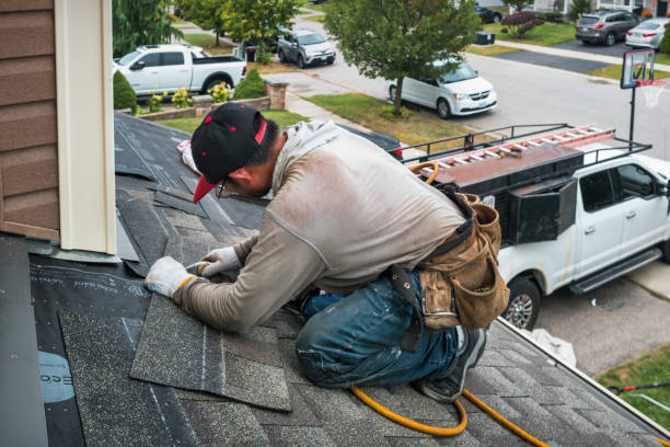 Professional Roofing technician working in West Suffield, CT